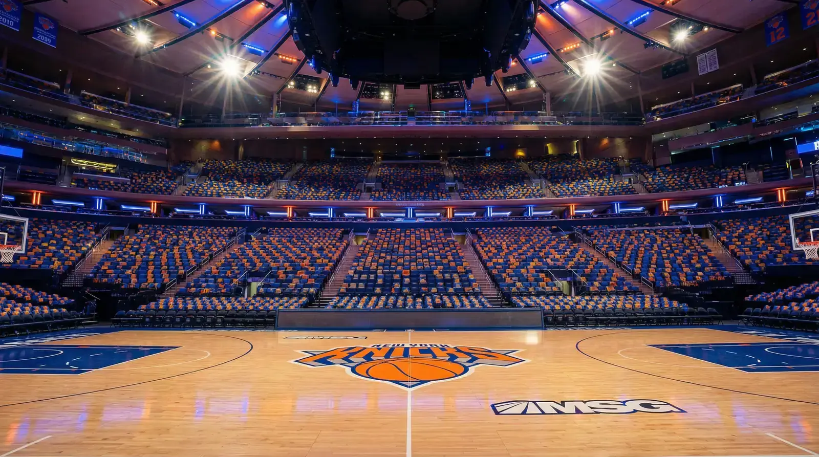 NBA arena filled with home crowd fans supporting their basketball team